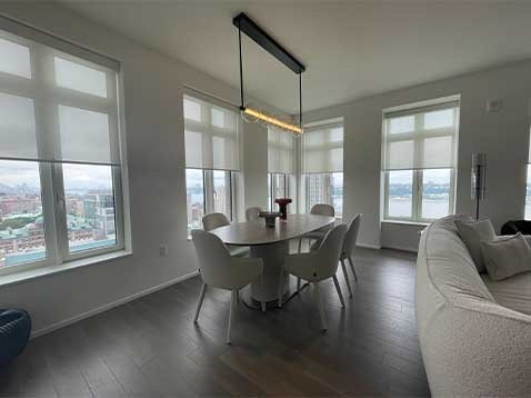 Dining room showcasing hanging shades